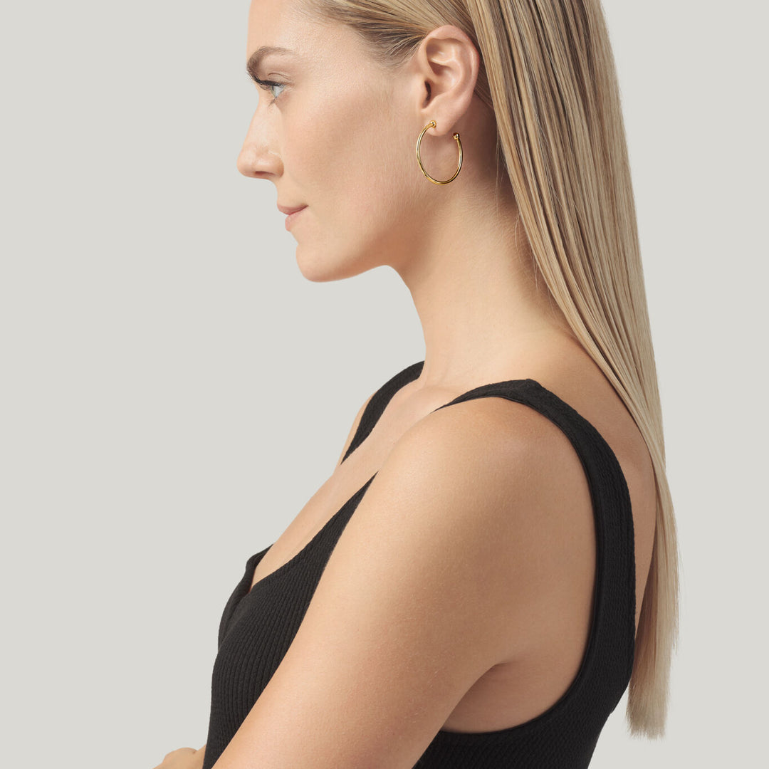 Pendientes Giovanni Raspini Axis en plata bañada en oro 12495