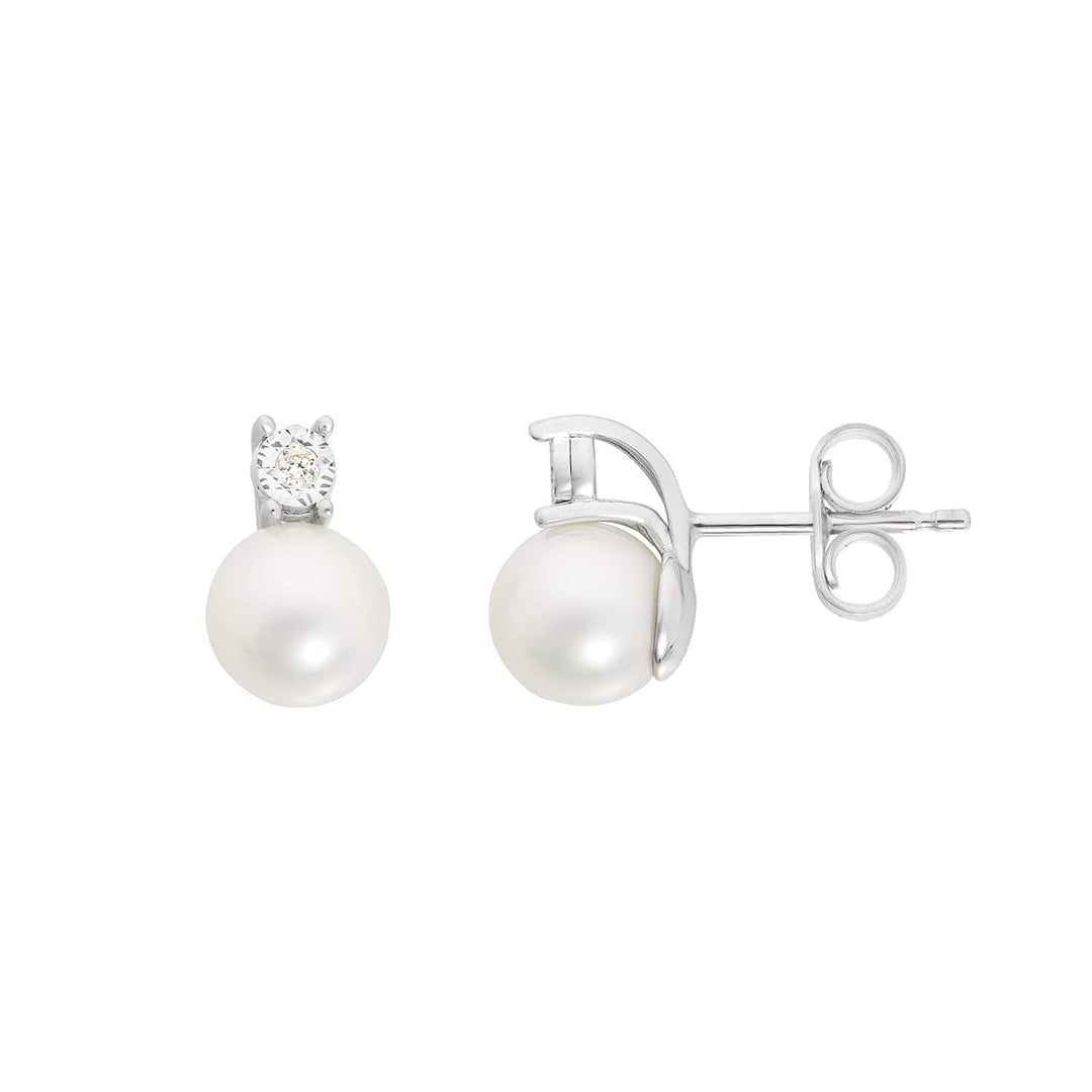 Pendientes Comete en oro blanco 375 ‰ con diamantes blancos y perlas cultivadas KORP012