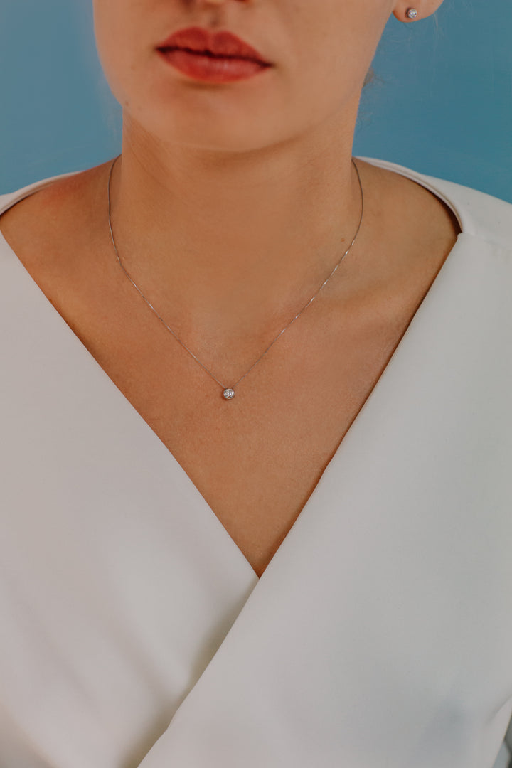 Comete Collana Punto luce tondo in Oro e Diamante GLB1418
