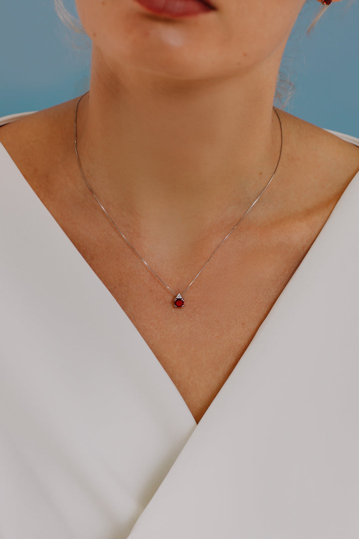 Comete Collana in Oro Diamante e Rubino tondo GLB1389