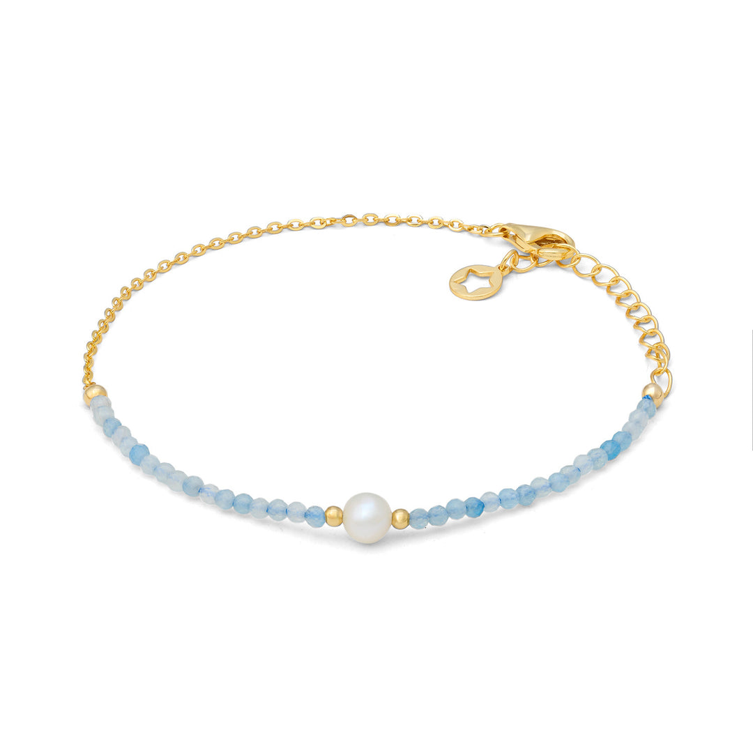 Comete Armband i 925‰ guldpläterat silver med akvamarin och pärla BRA287