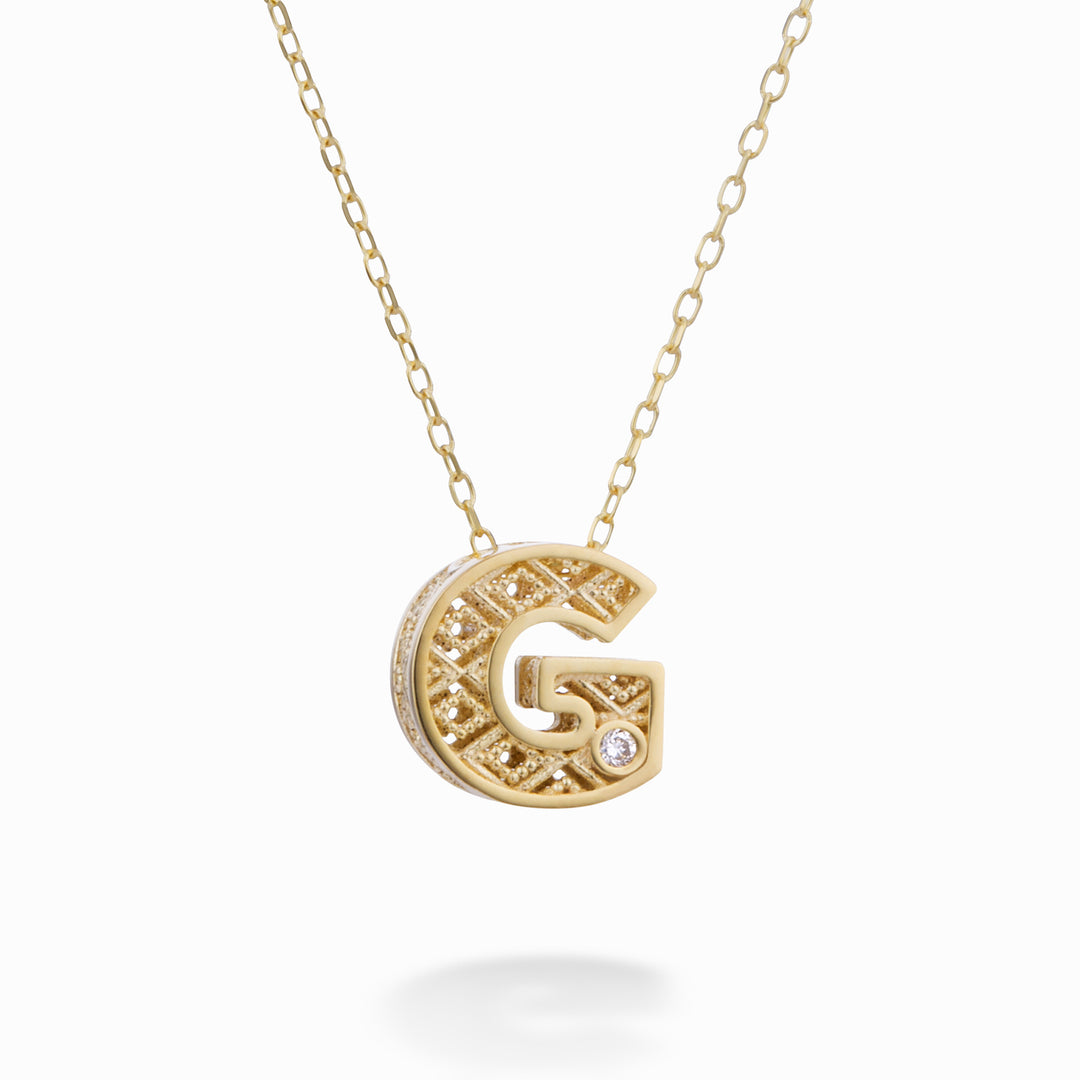 Nihama cl 18k harf g sarı altın çap. ct.0,01 NDLETGO1
