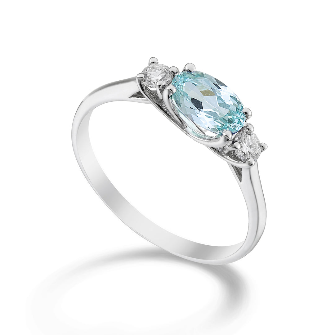 Mikiko uma turmalina paraíba 18k oval 7x5 ct.0.80 dia ct.0.16 MA5113O4PAR