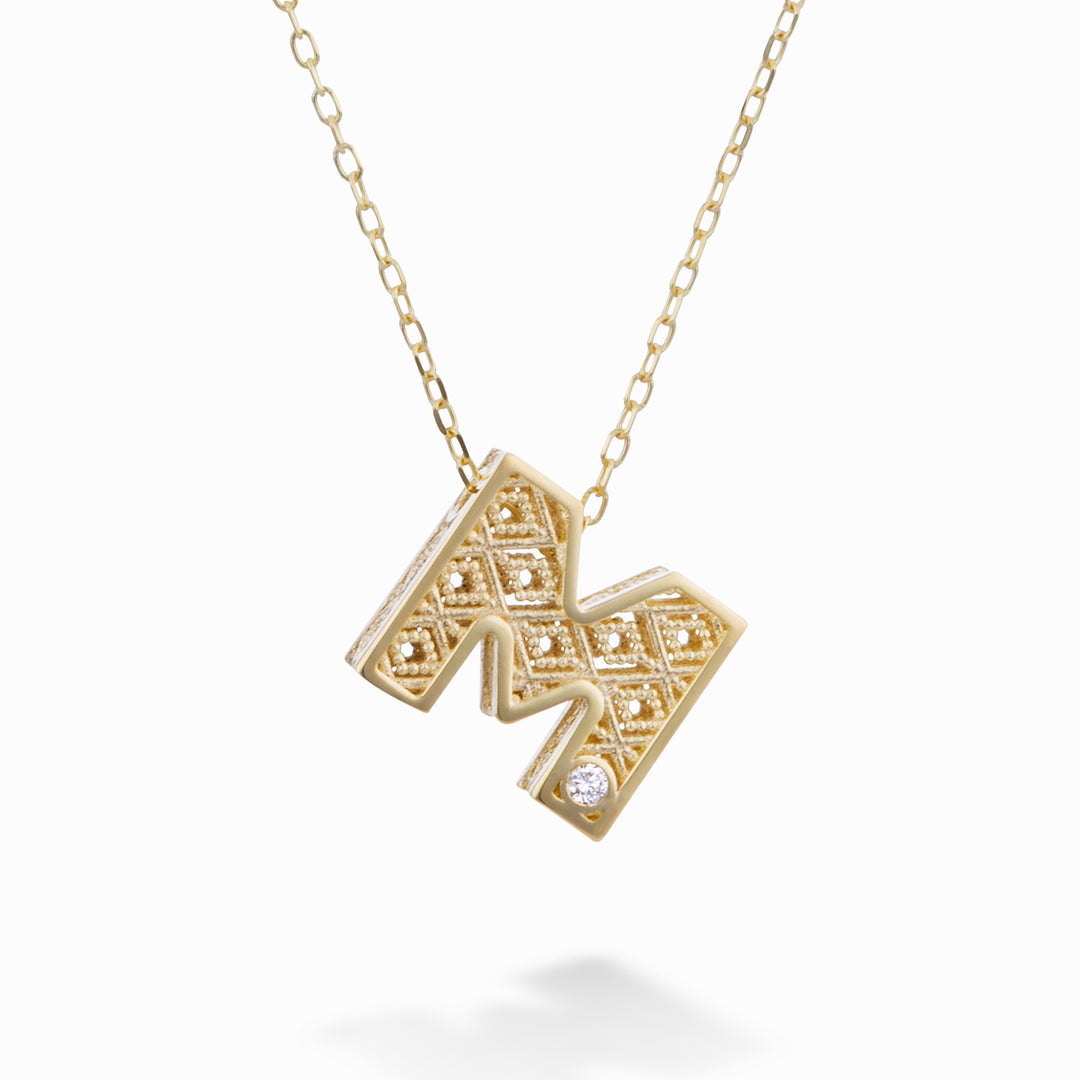 Mikiko cl 18k 字母 m 黄金直径。 ct.0.01 MDLETMO1