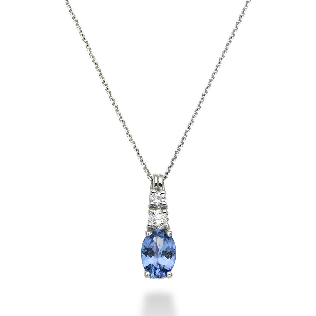 Nihama cl 18k tanzanit n. oval 7x5 ct.0.60 dia ct.0.15 ND5056O4TZN