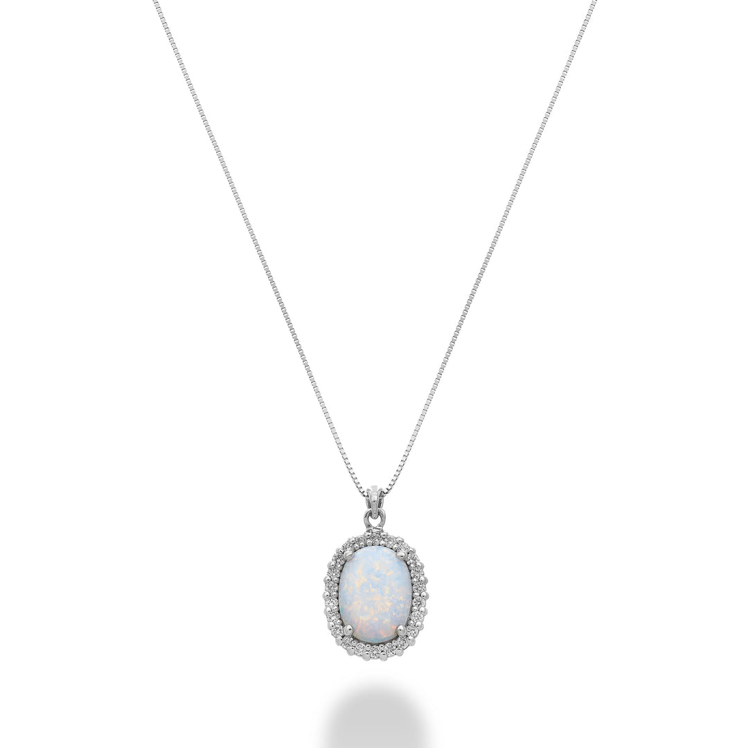 Nihama cl 18k opaal cabochon ovaal 7x5 en diamanten omlijning ND5192O4OP