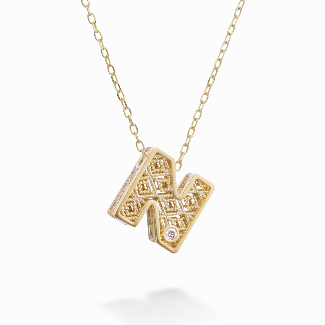 Mikiko cl 18k γράμμα n κίτρινο χρυσό διάμ. ct.0,01 MDLETNO1
