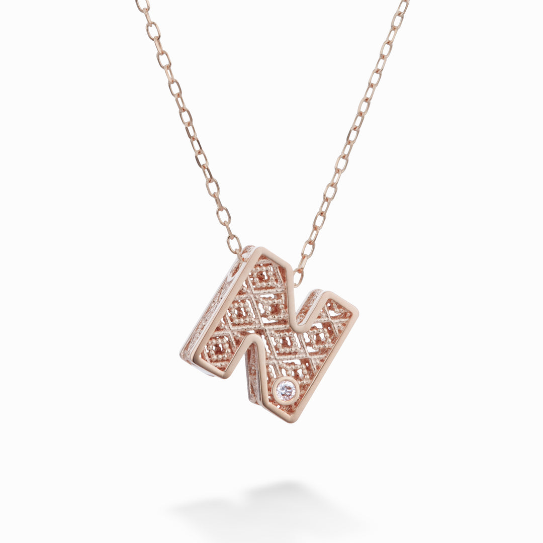 Mikiko cl 18k harf n pembe altın çap. ct.0,01 MDLETNO3