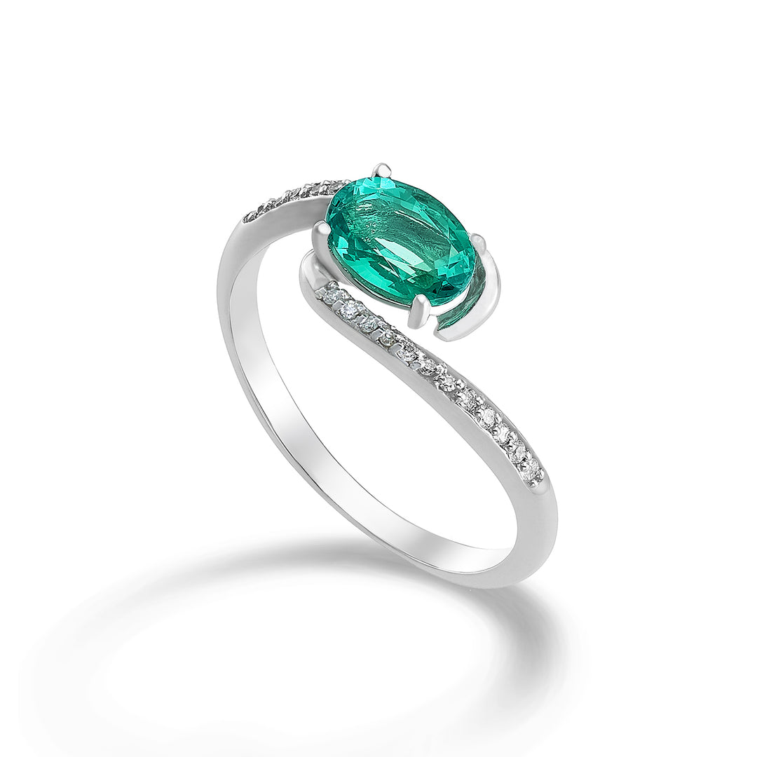 Mikiko, 18 ayar oval zümrüt 7x5 ct.0,60 çap. ct.0.085 MA5101O4BE