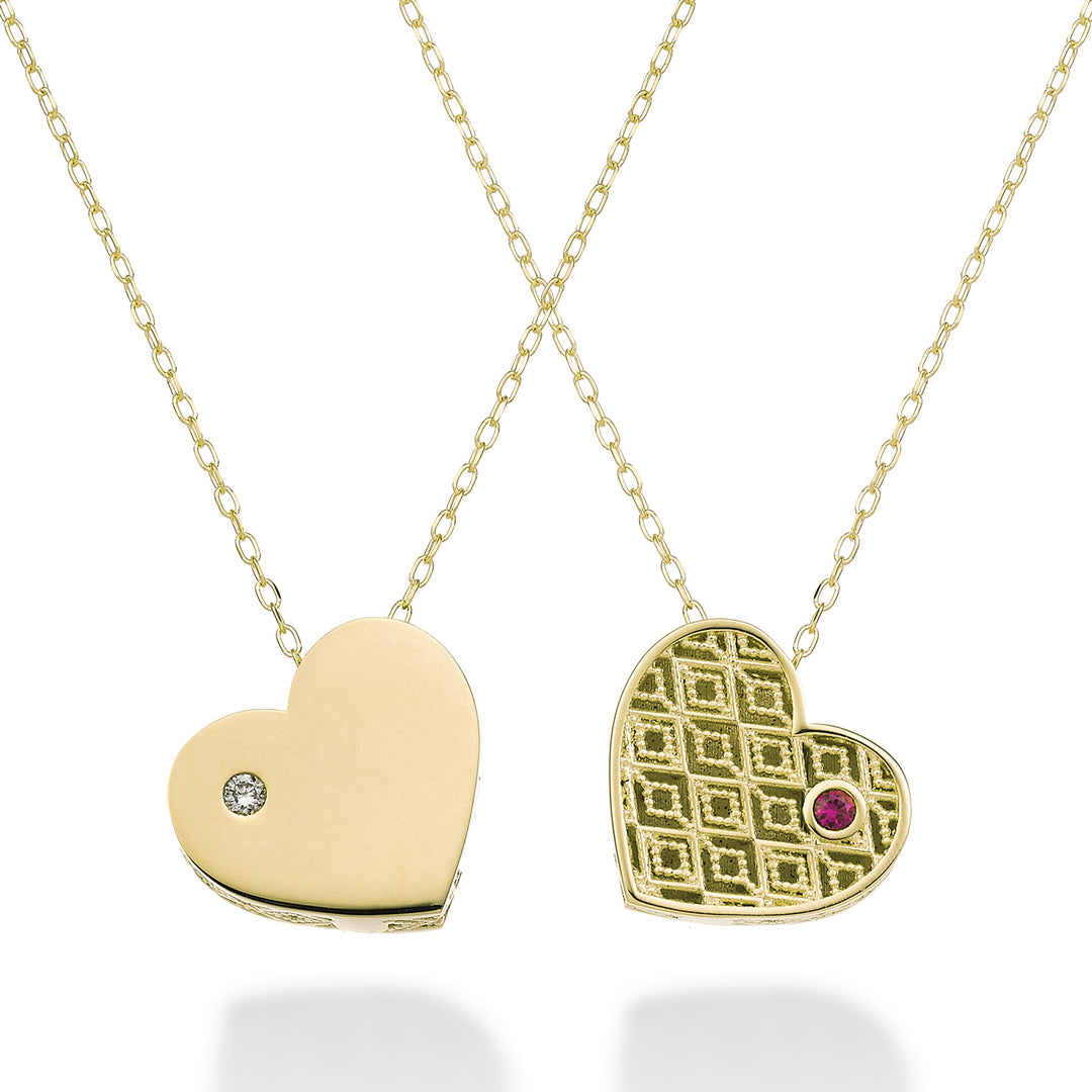 Mikiko cl 18k cuore medio un lato lucido oro giallo diam. ct.0,01 rubino ct.0,01 MDCUOREMLO1