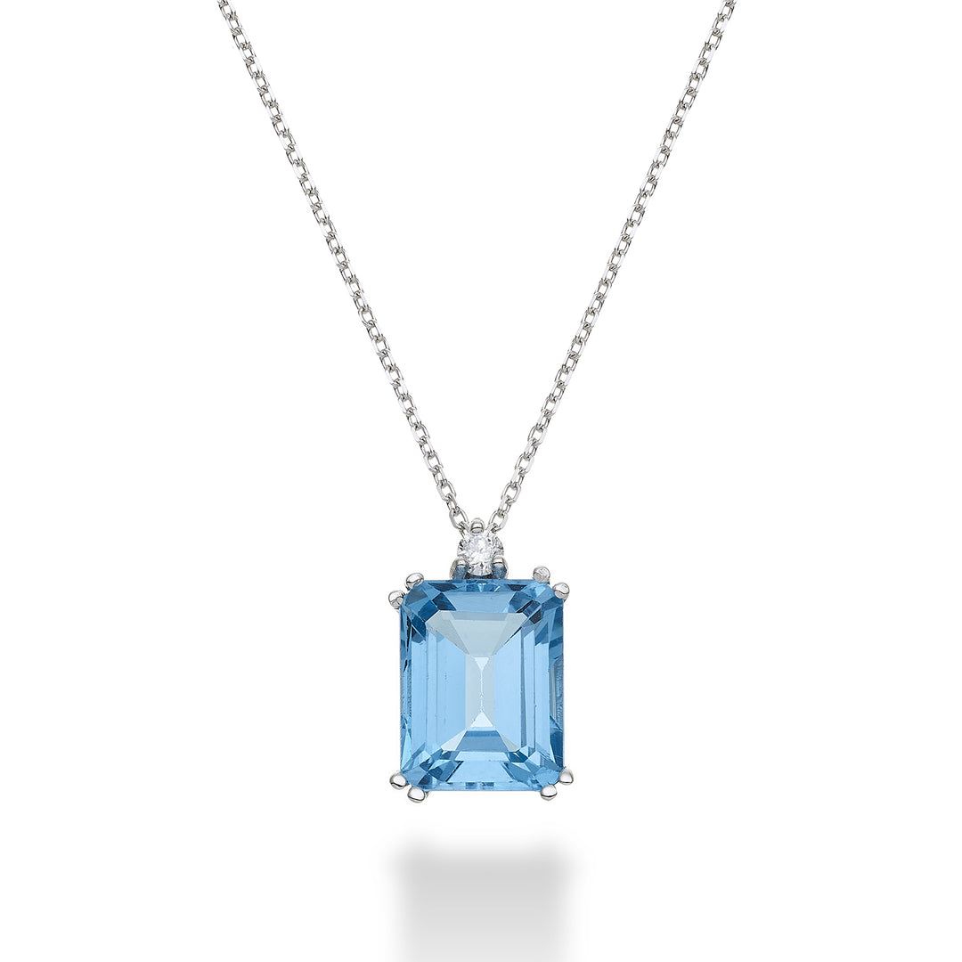 Mikiko cl 18k ośmiokątny niebieski topaz 7x9 ct.2,90 śr. ct.0,04 MPCL090DITPAZ4O4