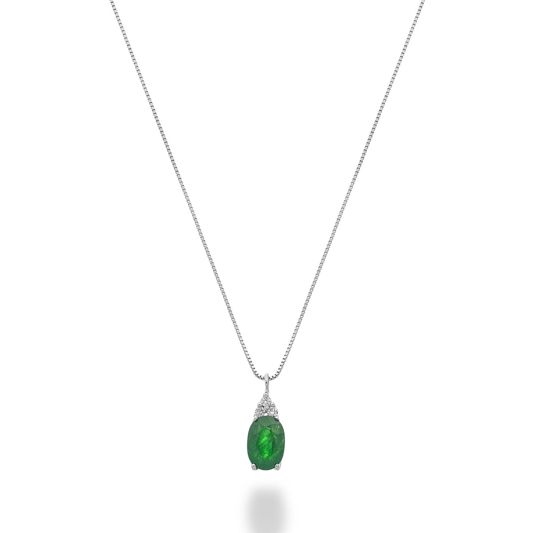 Nihama cl 18k esmeralda ovalada 6x4 con tres diamantes ND5188O4BE