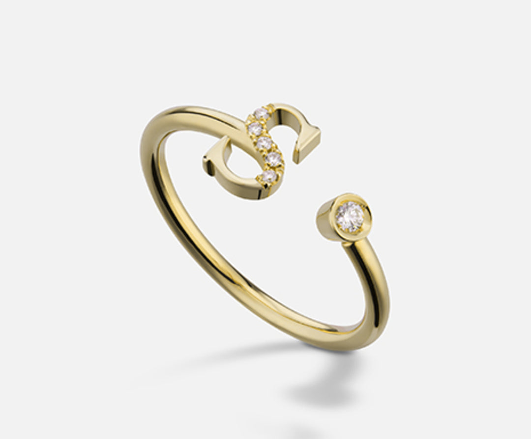 Golay una letra s grande en oro amarillo diam. ct.0.06 GAFSD2R1