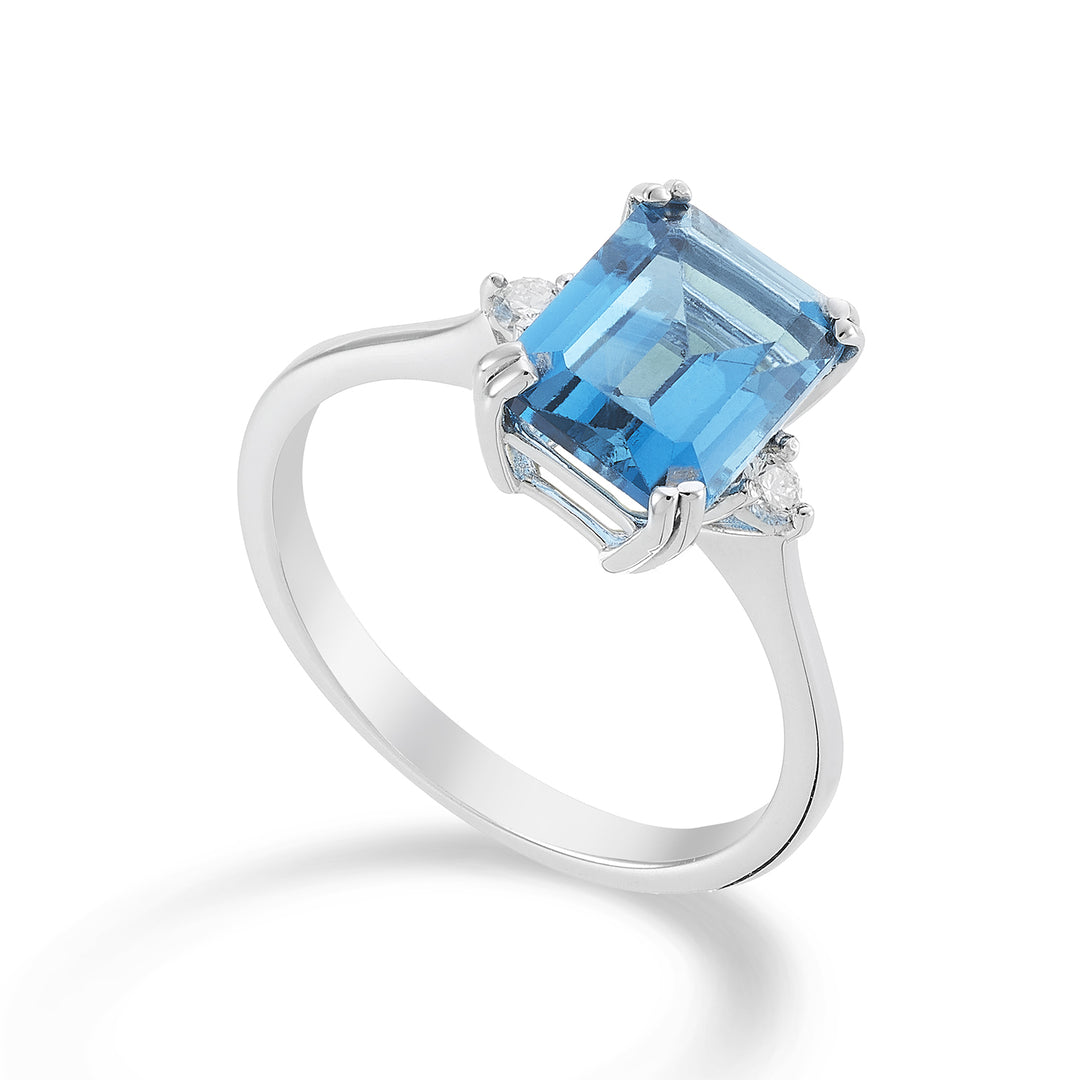 Mikiko en 18k åttakantig blå topas 7x9 ct.2.90 diam. ct.0,08 MACL090DITPAZ4O4