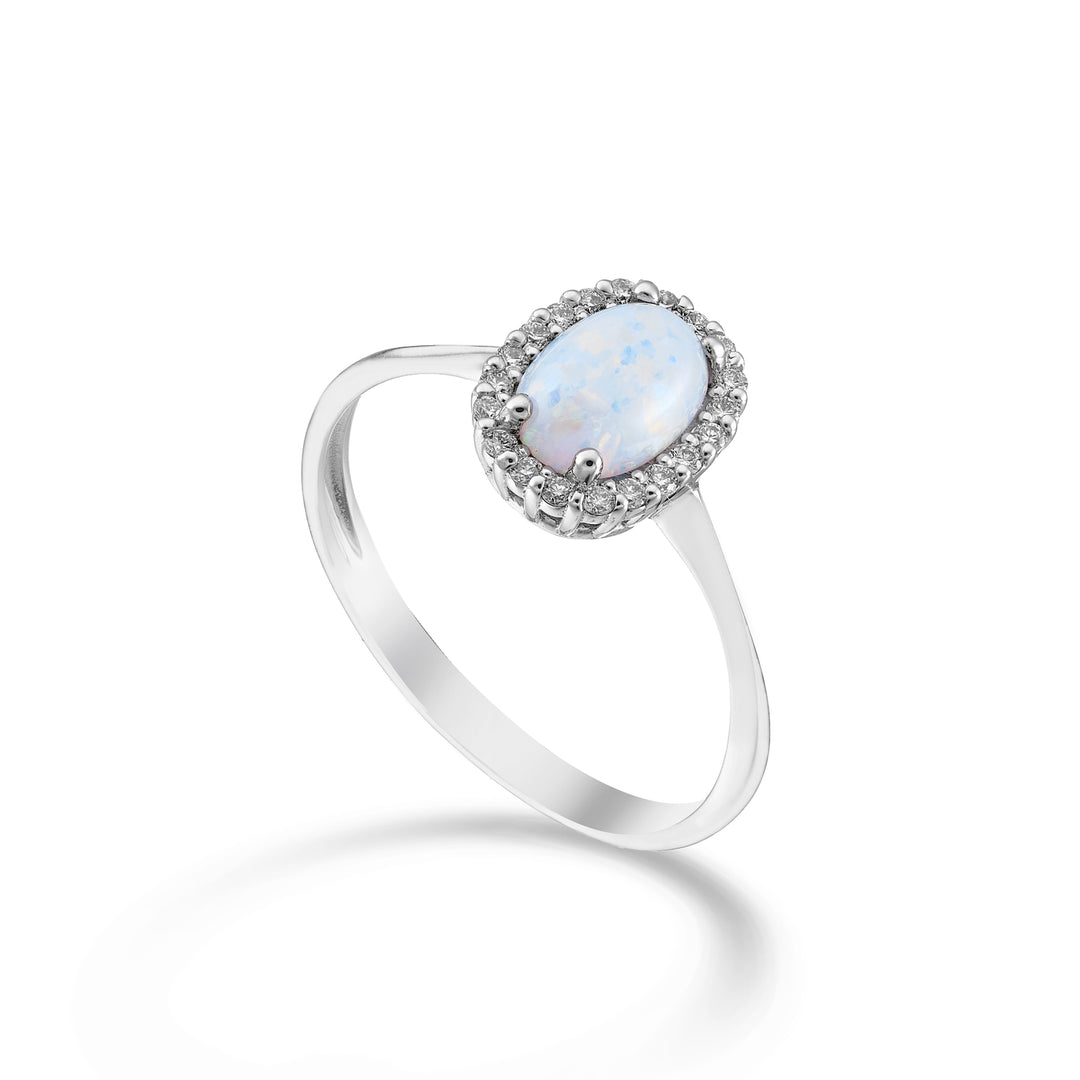 Nihama een 18k opaal cabochon ovaal 7x5, met diamantomtrek NA5207O4OP