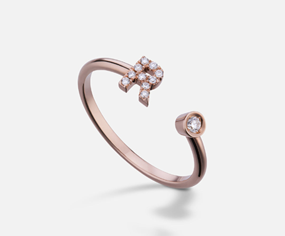 Golay en 9k bokstav r liten roséguld diam. ct.0.08 GAFRD1R3