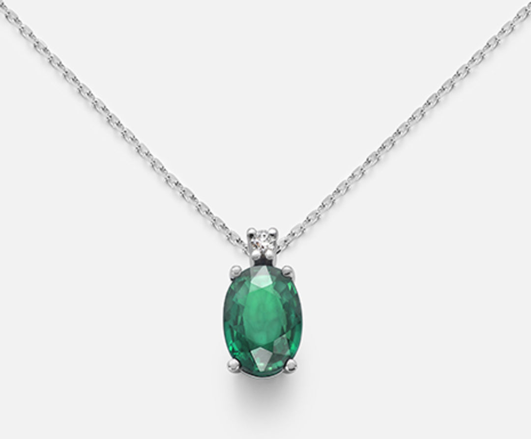 Mikiko cl 9k oval smaragd 7x5 ct.0,60 diam. ct.0.015 MD5035R4BE