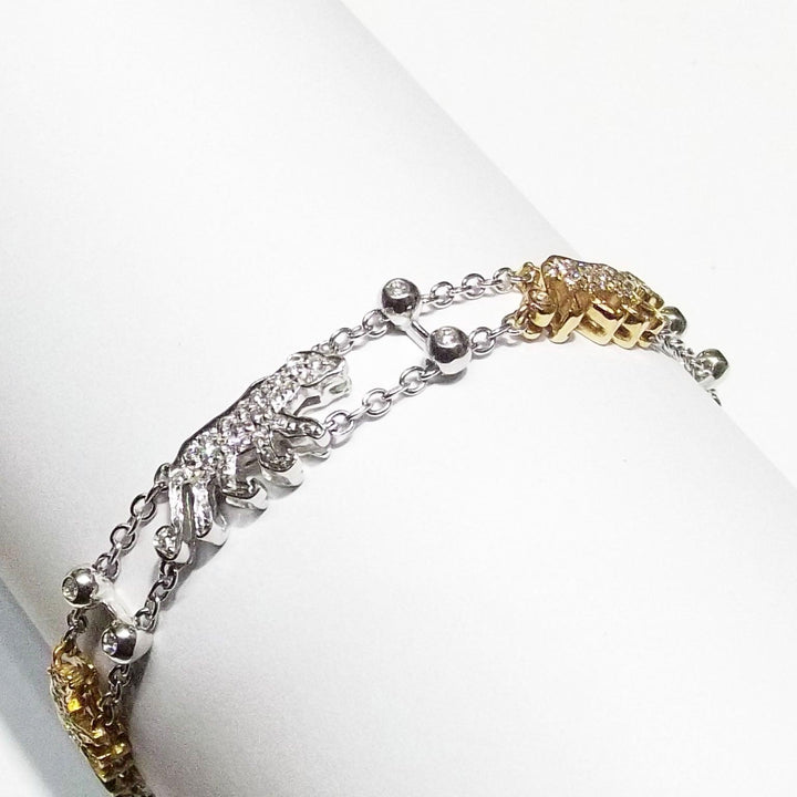 Taverna bracciale Pantere oro bianco e giallo 18kt diamanti - Capodagli 1937